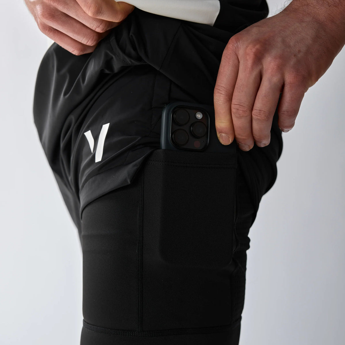 Vexo MatchMove Shorts – lightweight, breathable tennis shorts with built-in compression layer, towel holder, and zip pockets for secure storage.