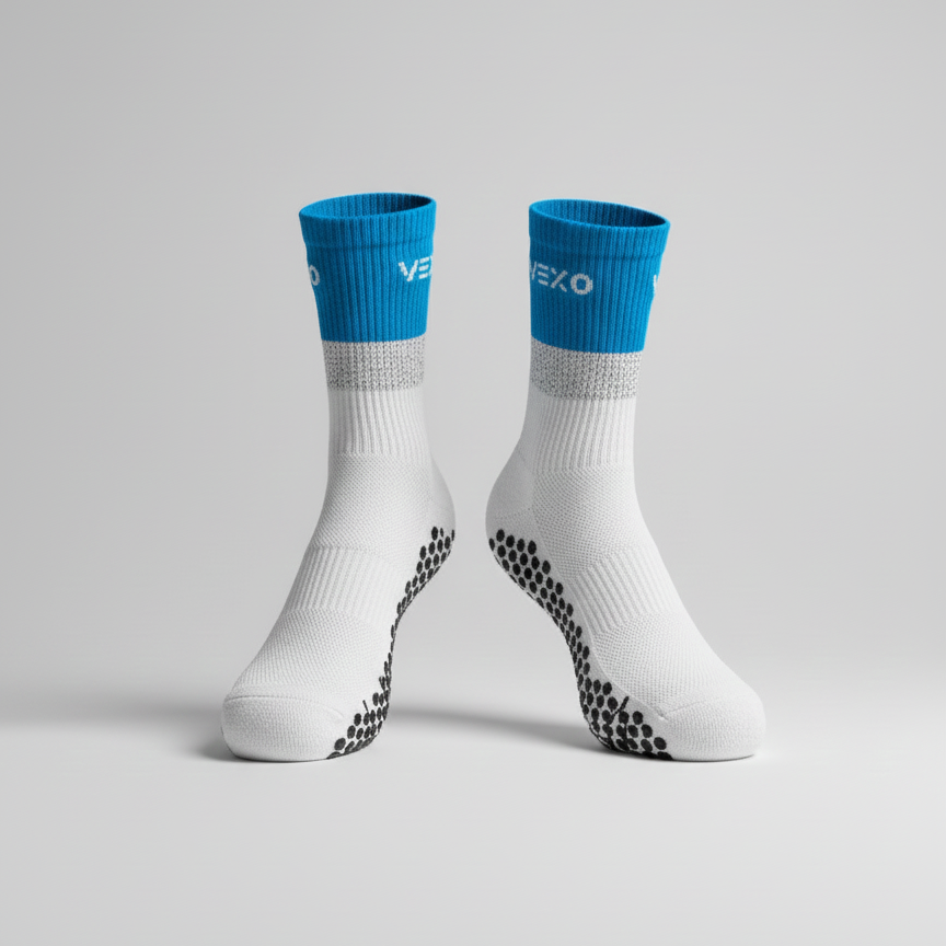 White socks with blue tops on a gray background