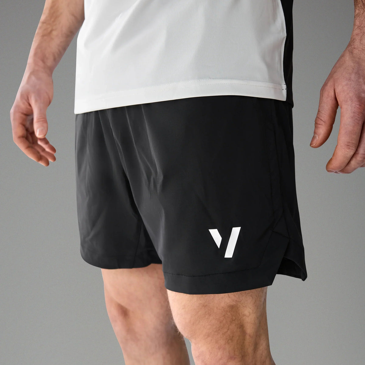 Vexo MatchMove Shorts – lightweight, breathable tennis shorts with built-in compression layer, towel holder, and zip pockets for secure storage.