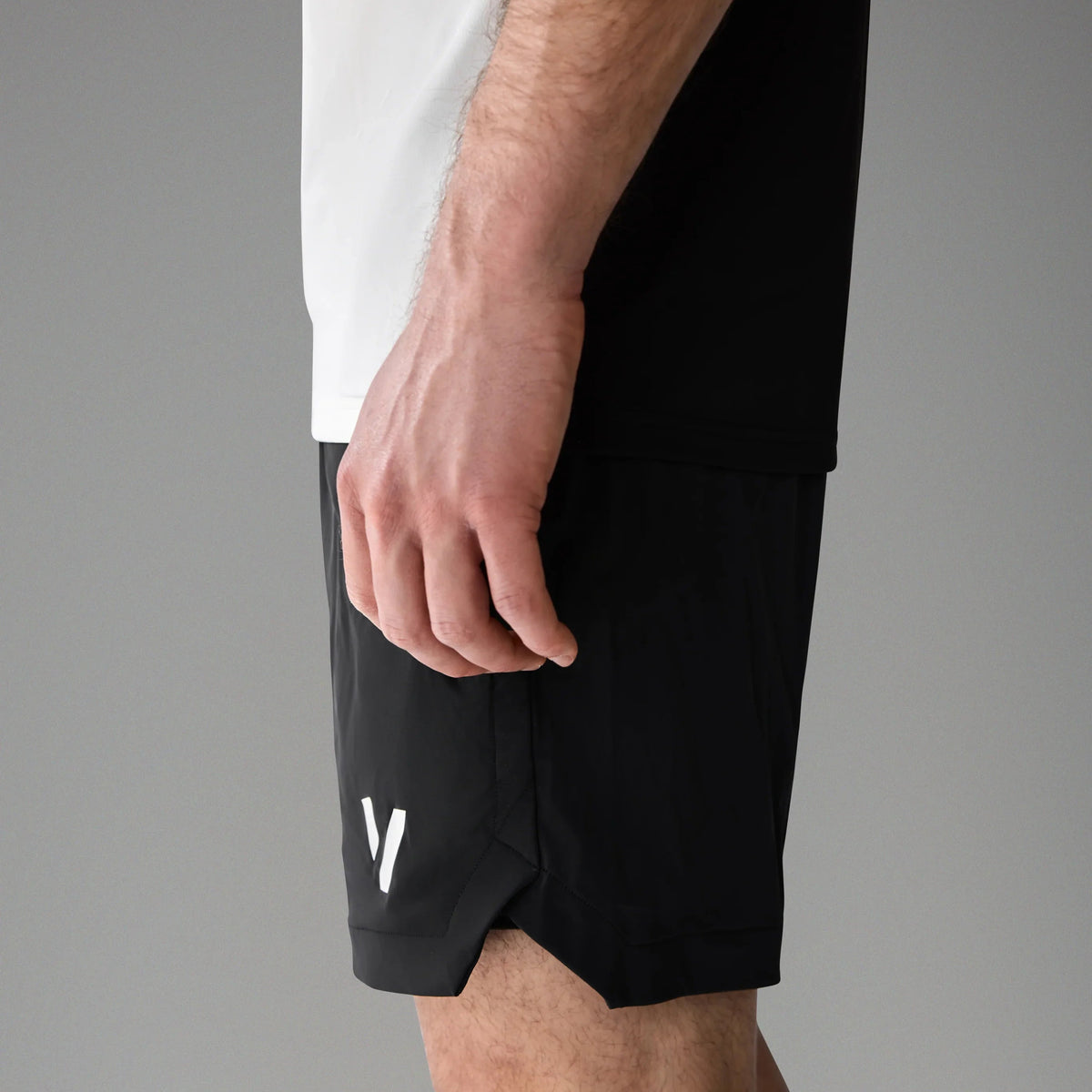 Vexo MatchMove Shorts – lightweight, breathable tennis shorts with built-in compression layer, towel holder, and zip pockets for secure storage.