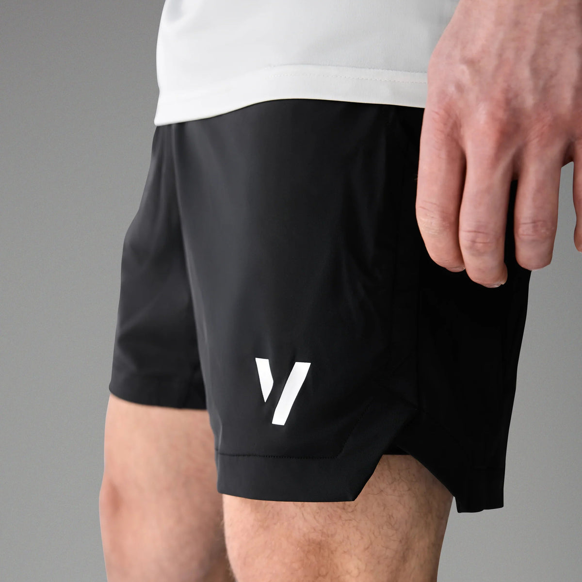 Vexo MatchMove Shorts – lightweight, breathable tennis shorts with built-in compression layer, towel holder, and zip pockets for secure storage.