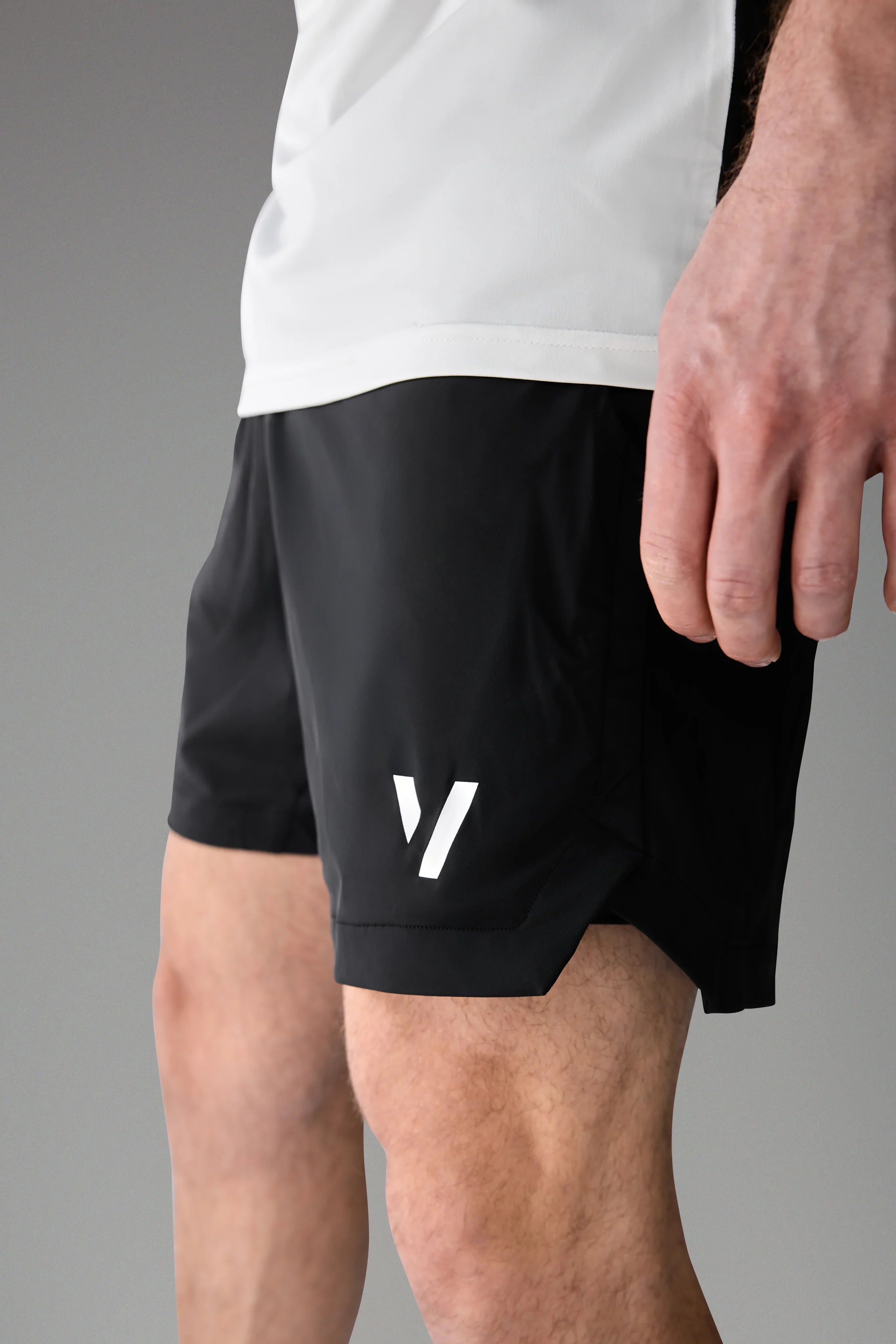 Vexo MatchMove Shorts – lightweight, breathable tennis shorts with built-in compression layer, towel holder, and zip pockets for secure storage.