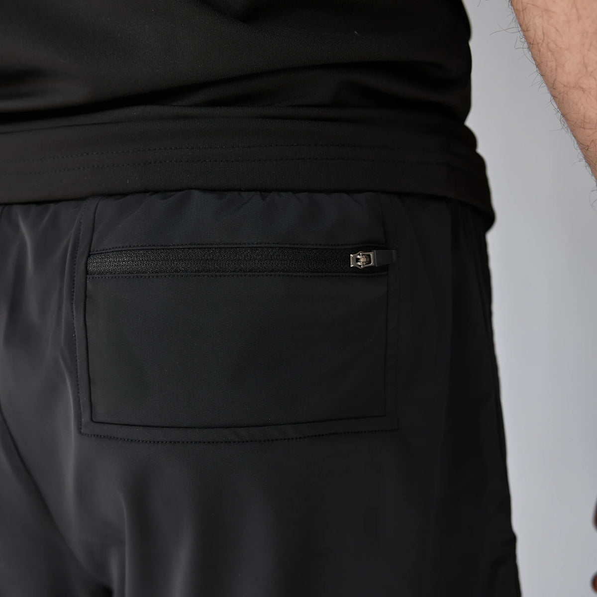 Vexo MatchMove Shorts – lightweight, breathable tennis shorts with built-in compression layer, towel holder, and zip pockets for secure storage.