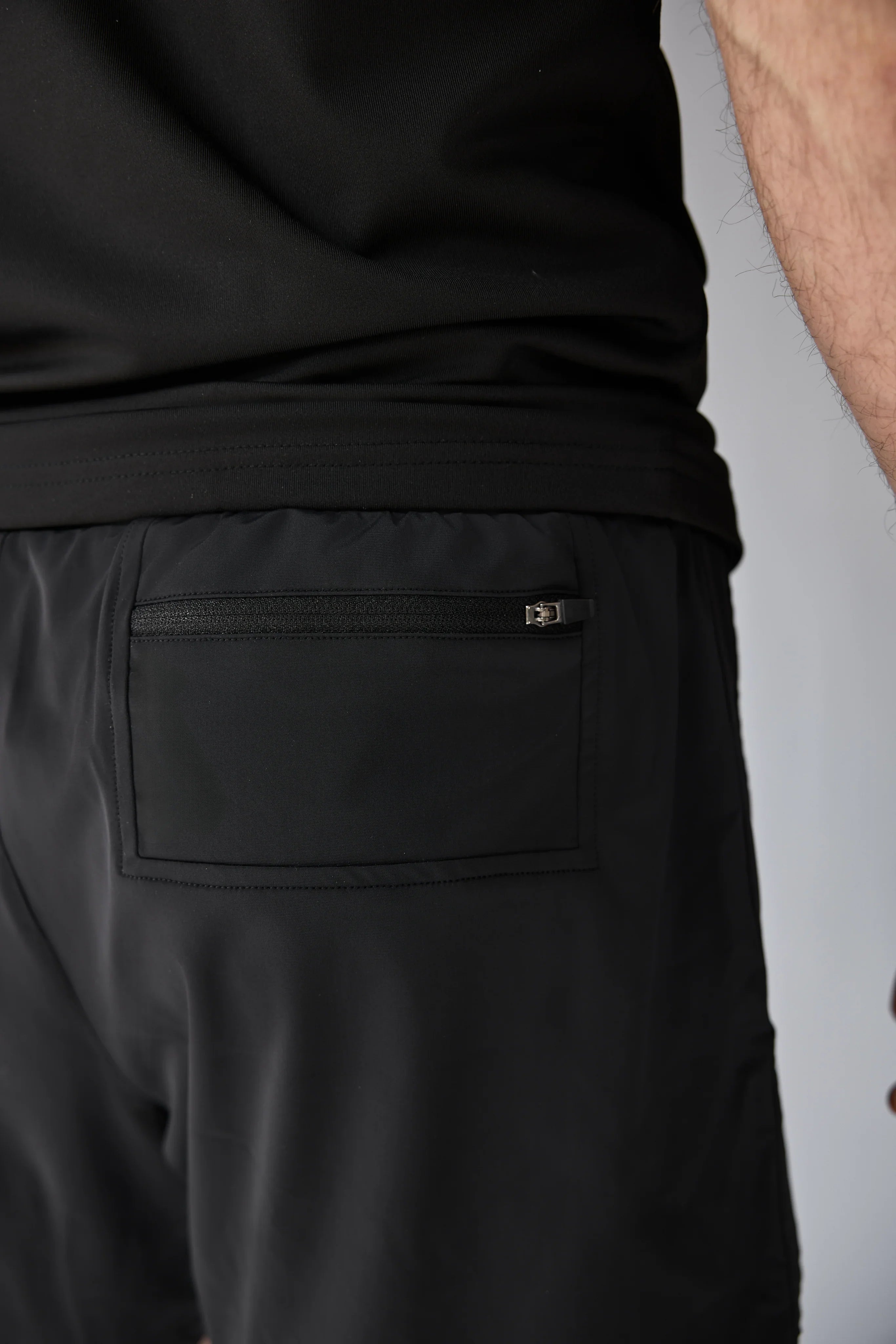 Vexo MatchMove Shorts – lightweight, breathable tennis shorts with built-in compression layer, towel holder, and zip pockets for secure storage.
