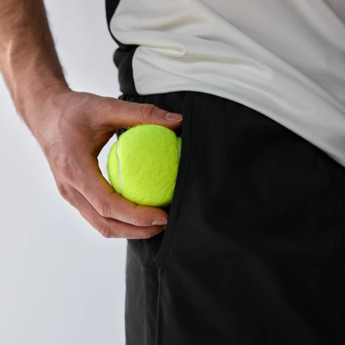 Vexo MatchMove Shorts – lightweight, breathable tennis shorts with built-in compression layer, towel holder, and zip pockets for secure storage.