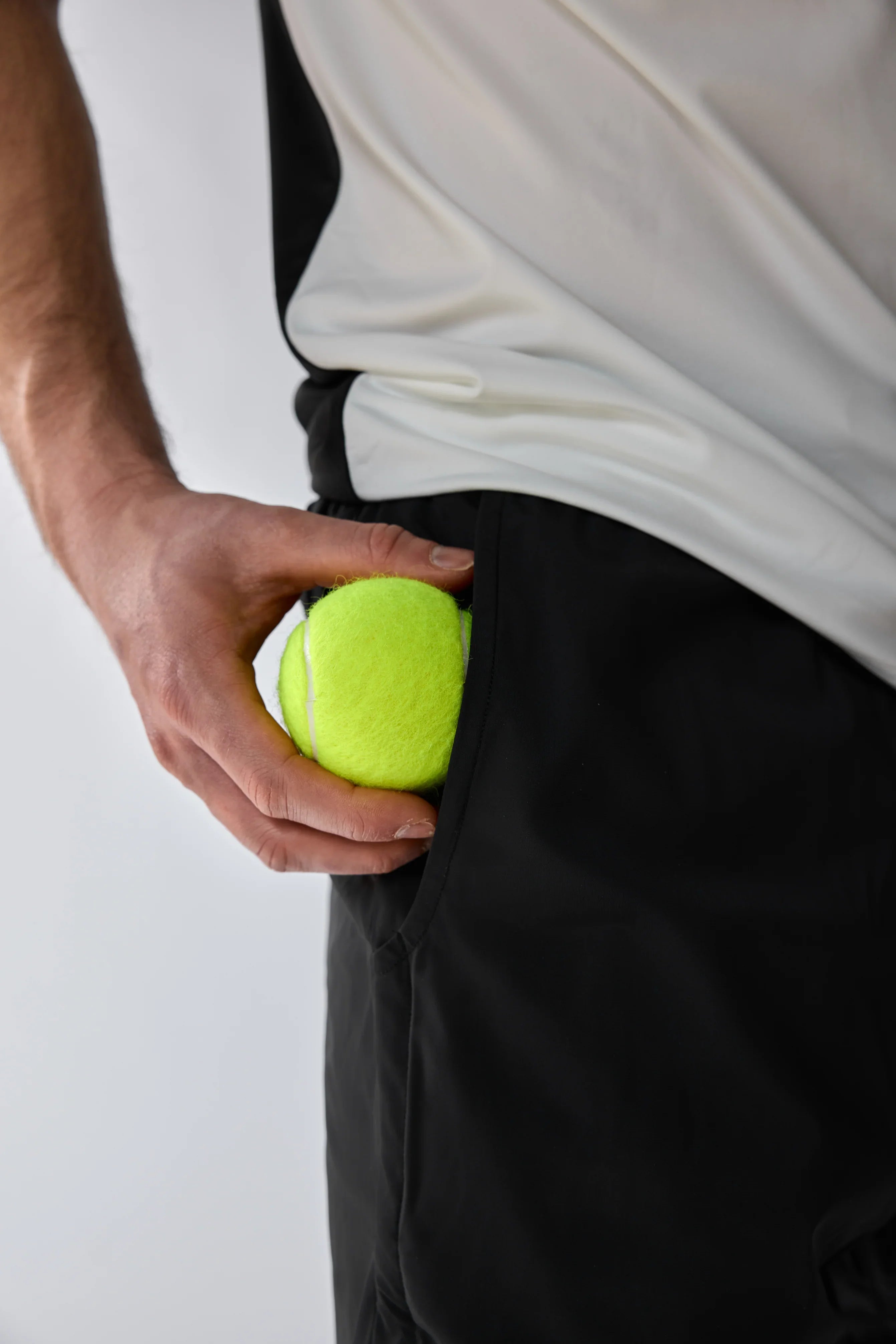 Vexo MatchMove Shorts – lightweight, breathable tennis shorts with built-in compression layer, towel holder, and zip pockets for secure storage.