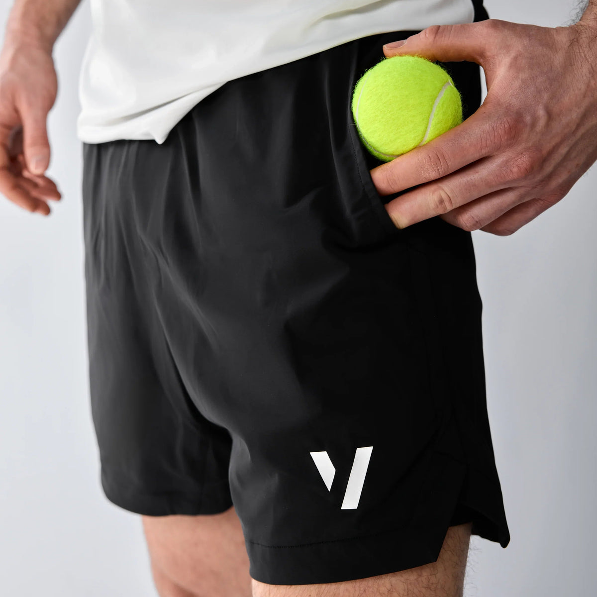 Vexo MatchMove Shorts – lightweight, breathable tennis shorts with built-in compression layer, towel holder, and zip pockets for secure storage.