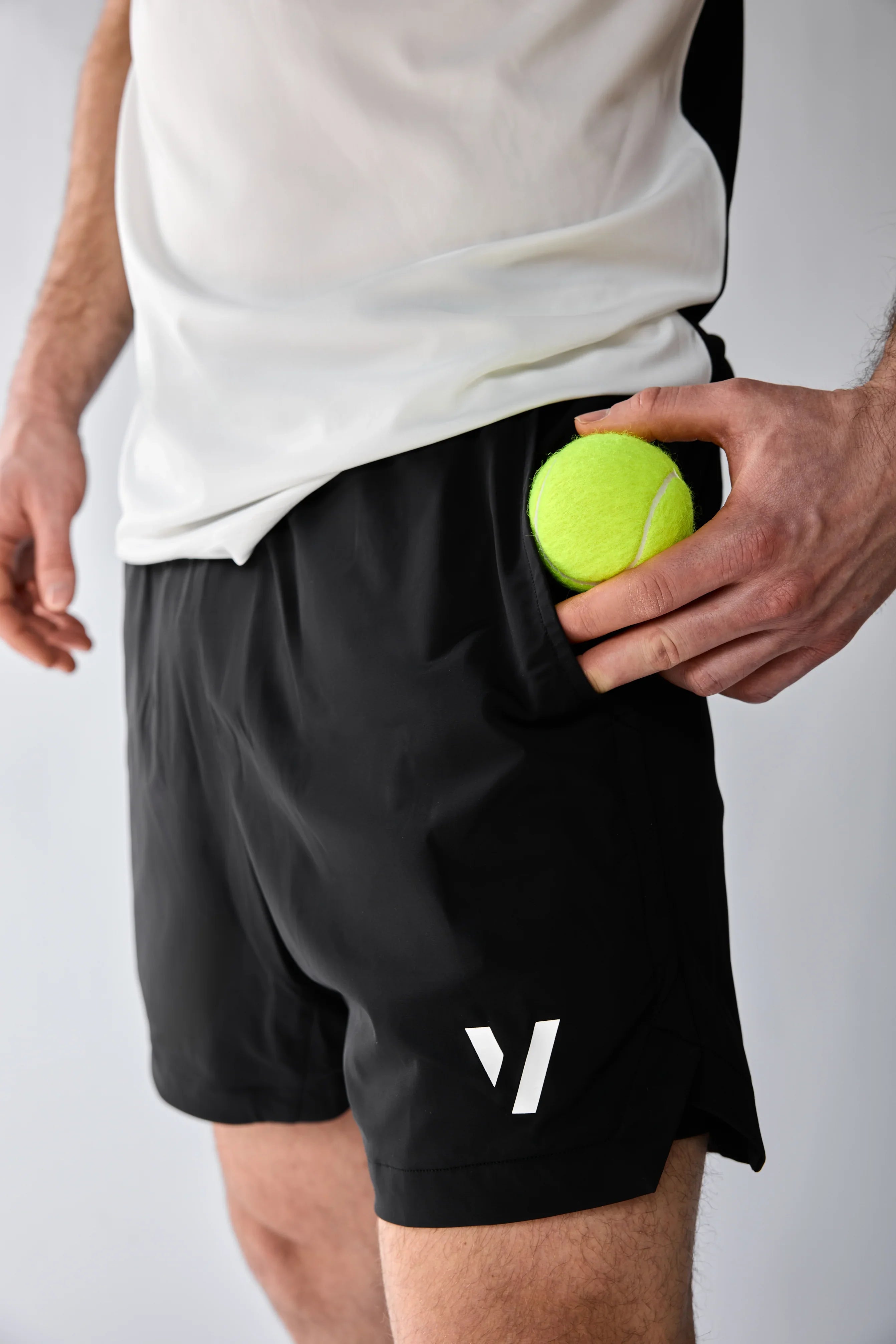 Vexo MatchMove Shorts – lightweight, breathable tennis shorts with built-in compression layer, towel holder, and zip pockets for secure storage.