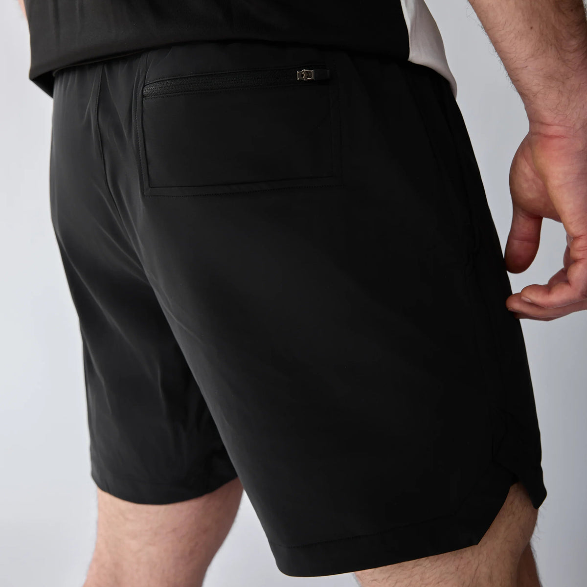 Vexo MatchMove Shorts – lightweight, breathable tennis shorts with built-in compression layer, towel holder, and zip pockets for secure storage.