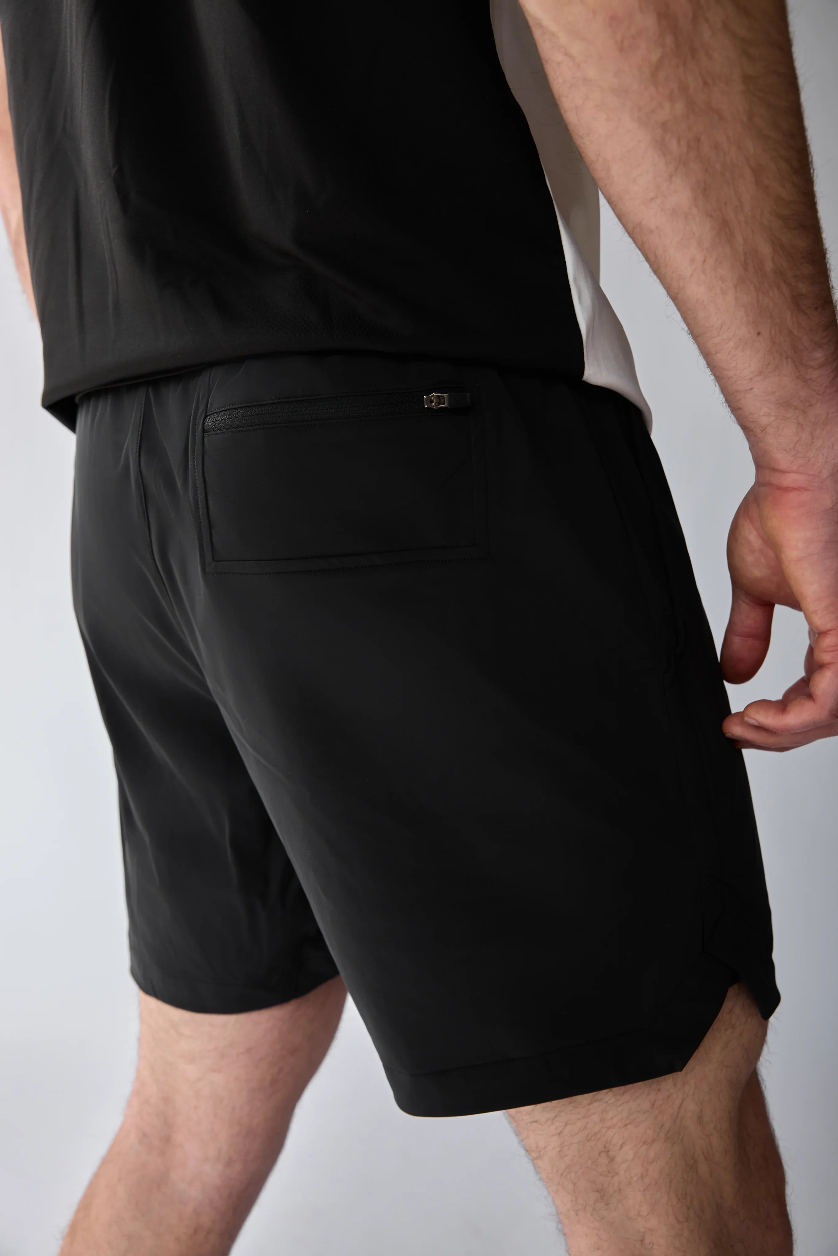 Vexo MatchMove Shorts – lightweight, breathable tennis shorts with built-in compression layer, towel holder, and zip pockets for secure storage.
