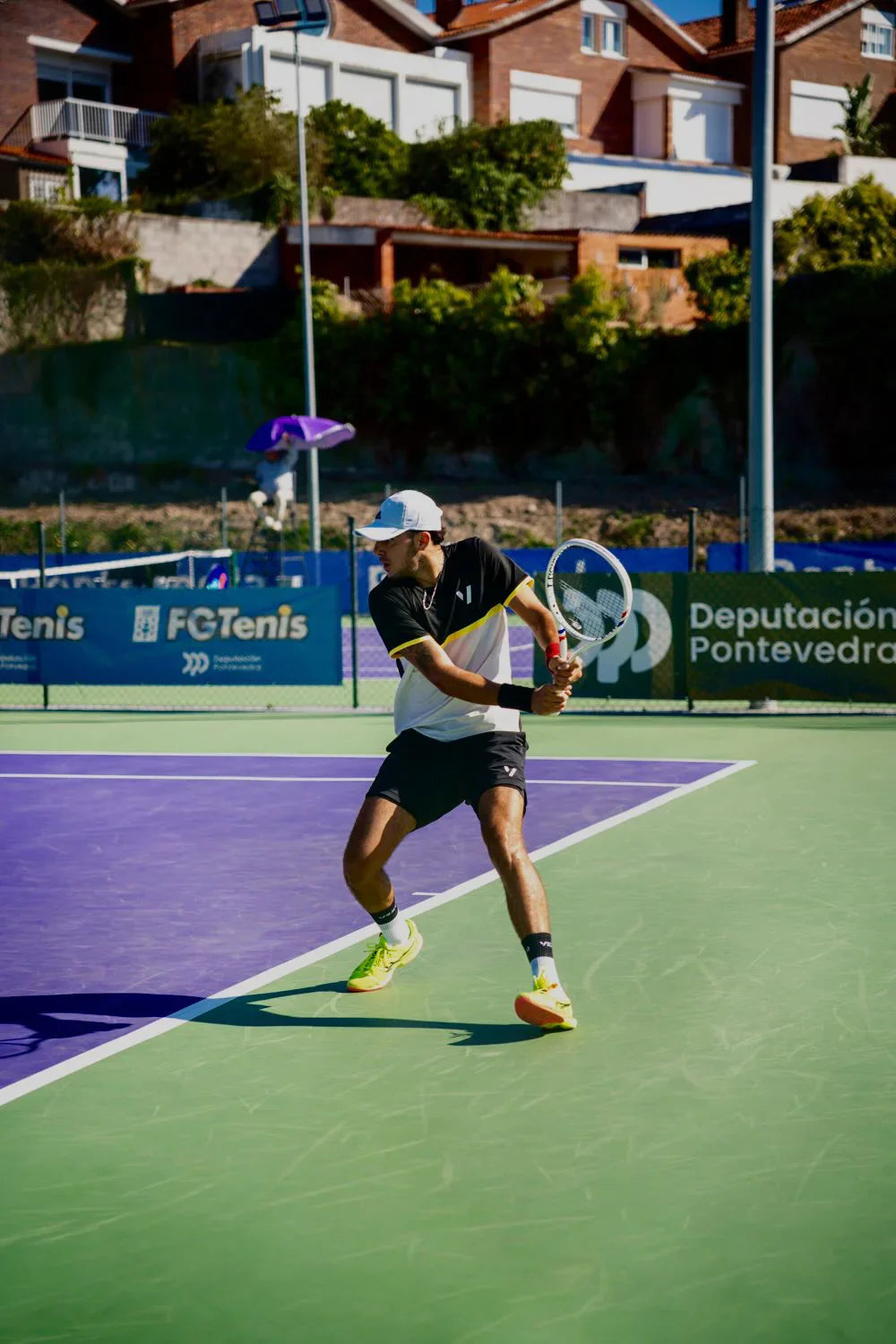 Polyester tennis shirt in action - Vexo PrimeFit Match Tee moisture-wicking fabric on court