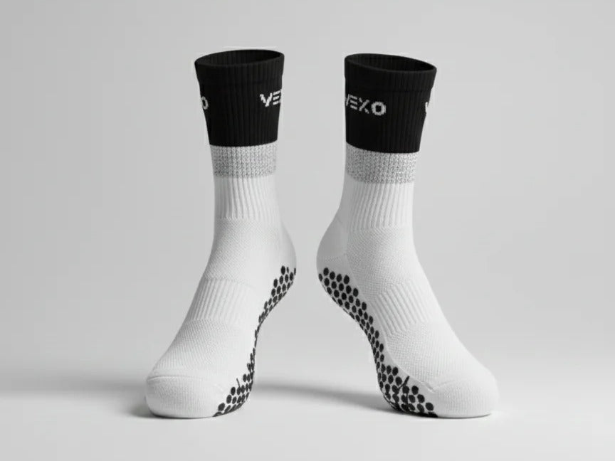 The Vexo CourtGrip Socks (€25, 2-pack) are built around targeted grip zones that lock your foot in place and cut the in-shoe sliding that causes blisters and slipping.