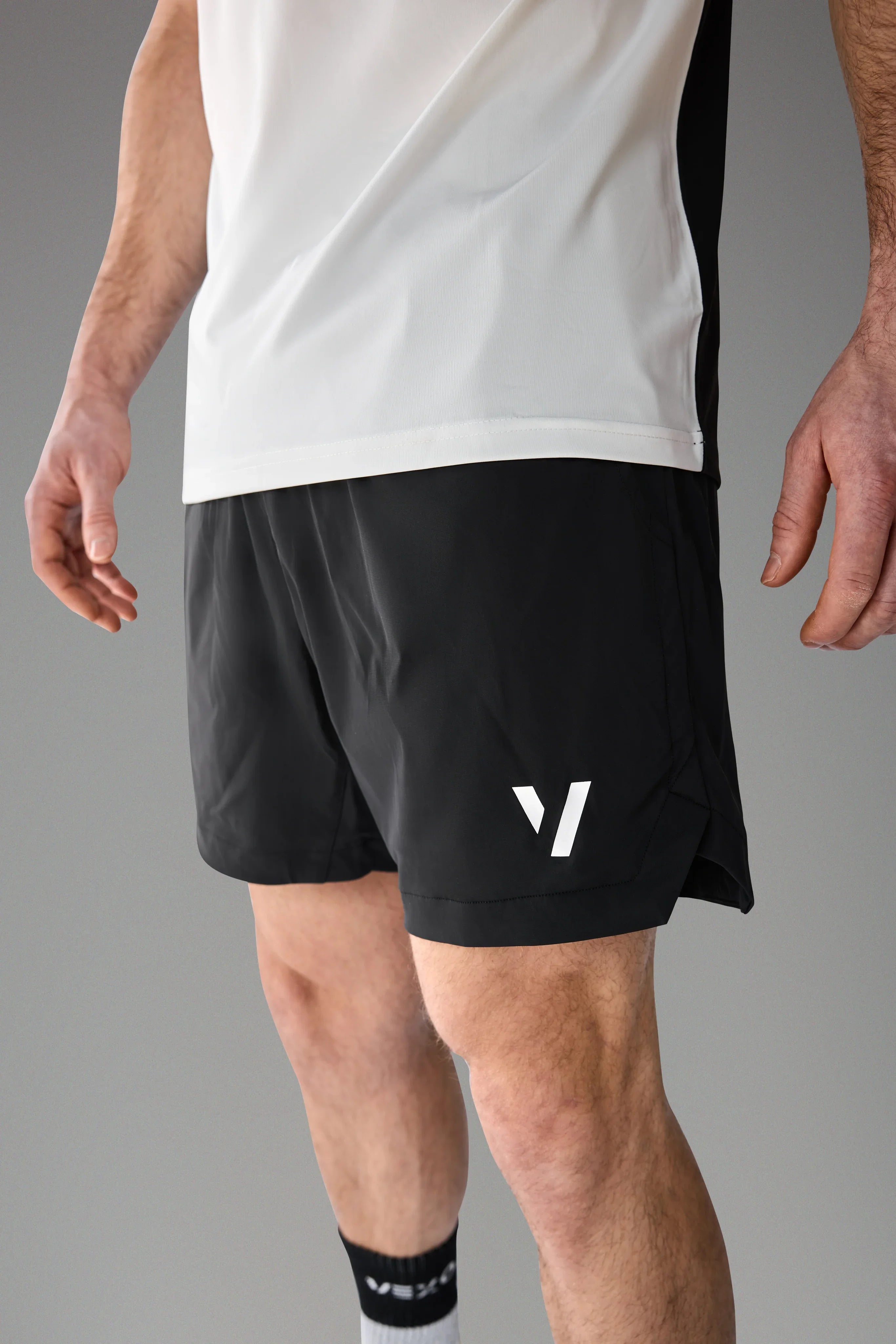 Vexo MatchMove Shorts – lightweight, breathable tennis shorts with built-in compression layer, towel holder, and zip pockets for secure storage.