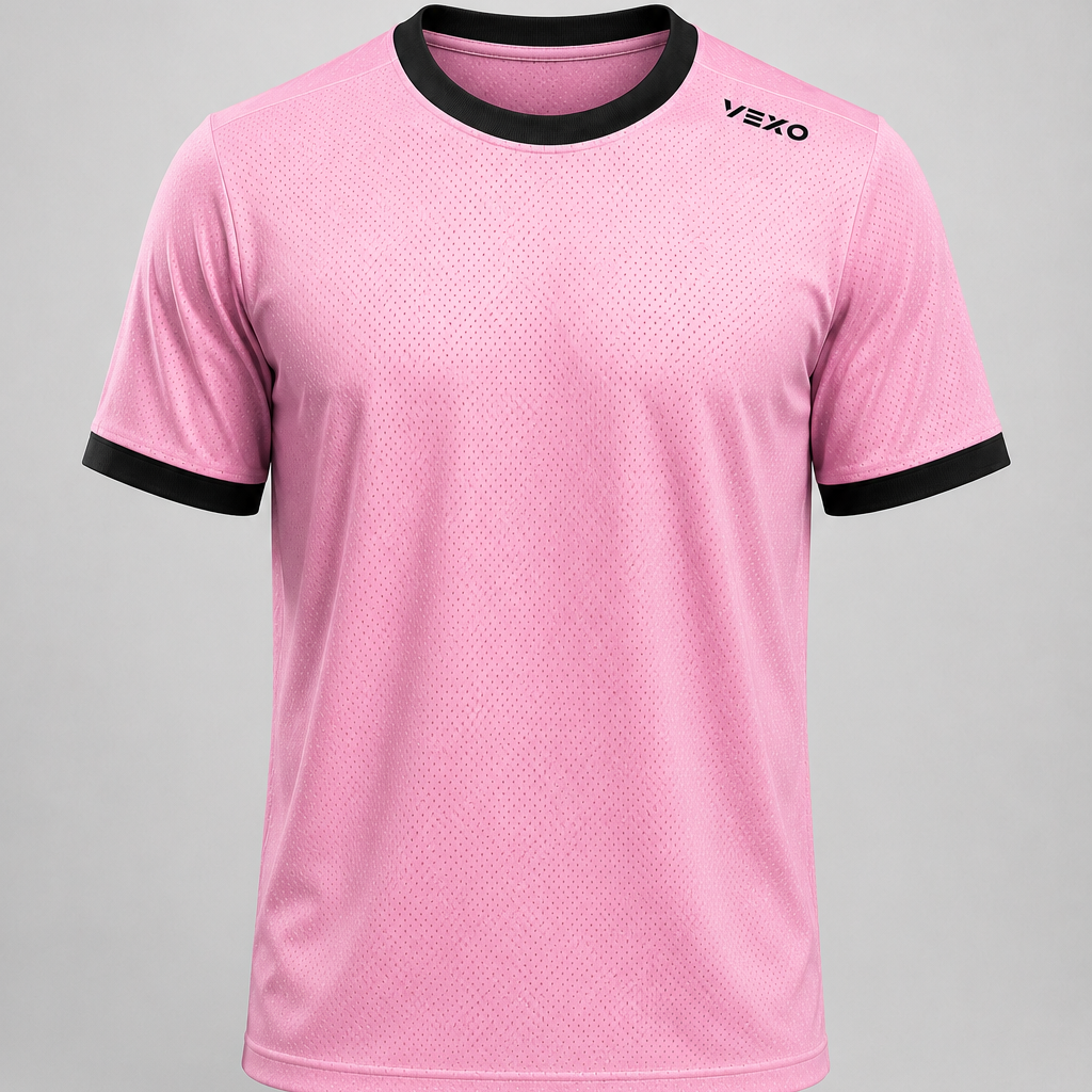 A pink short-sleeve athletic t-shirt with black trim on the crew neck and sleeve cuffs, featuring a black VEXO logo on the left chest, displayed against a neutral gray background.